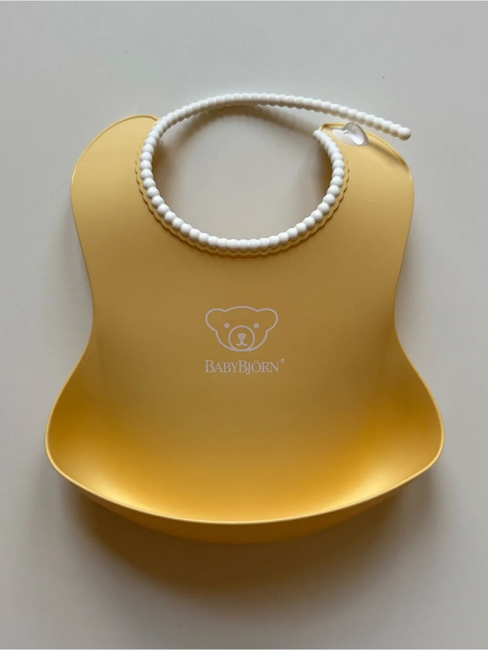Set of 2 BabyBjorn Feeding Bibs - Blue & Yellow
